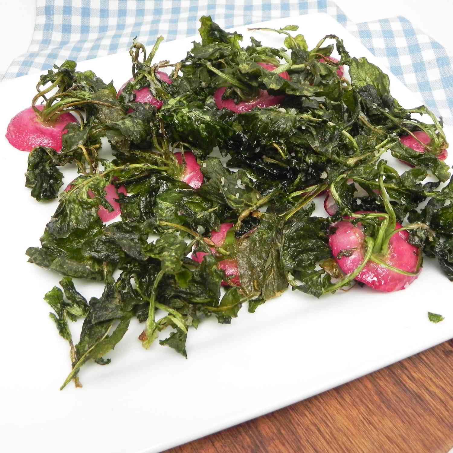 radish green chips on a plate