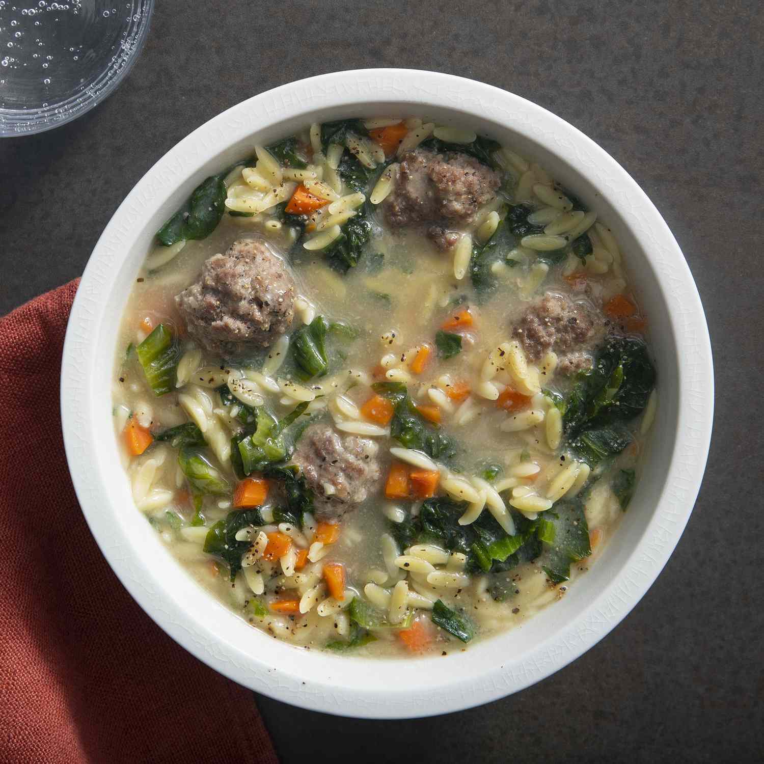 overhead view of a bowl of Italian wedding soup