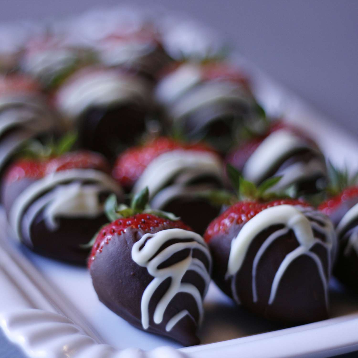close up view of Chocolate-Covered Strawberries on a platter