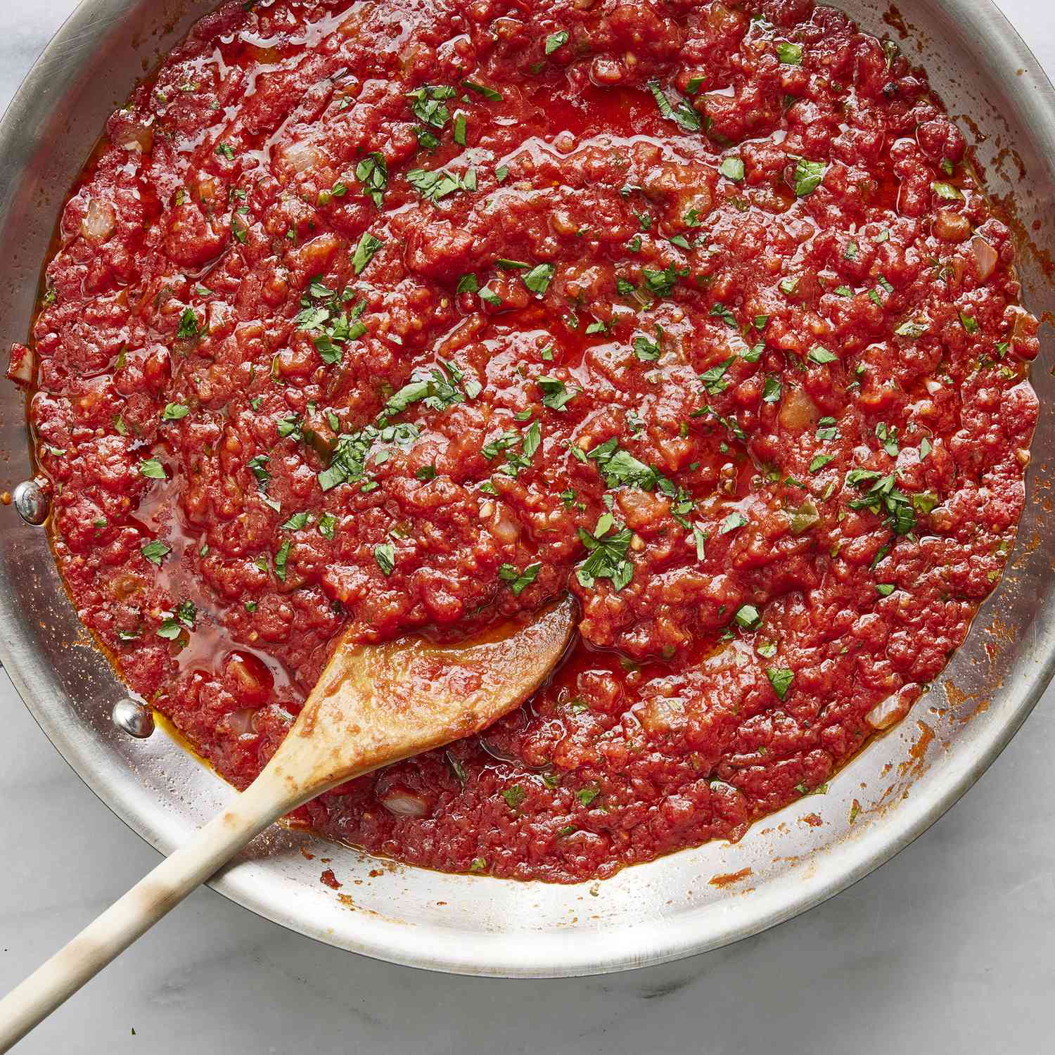 overhead view of marinara sauce in a large skillet