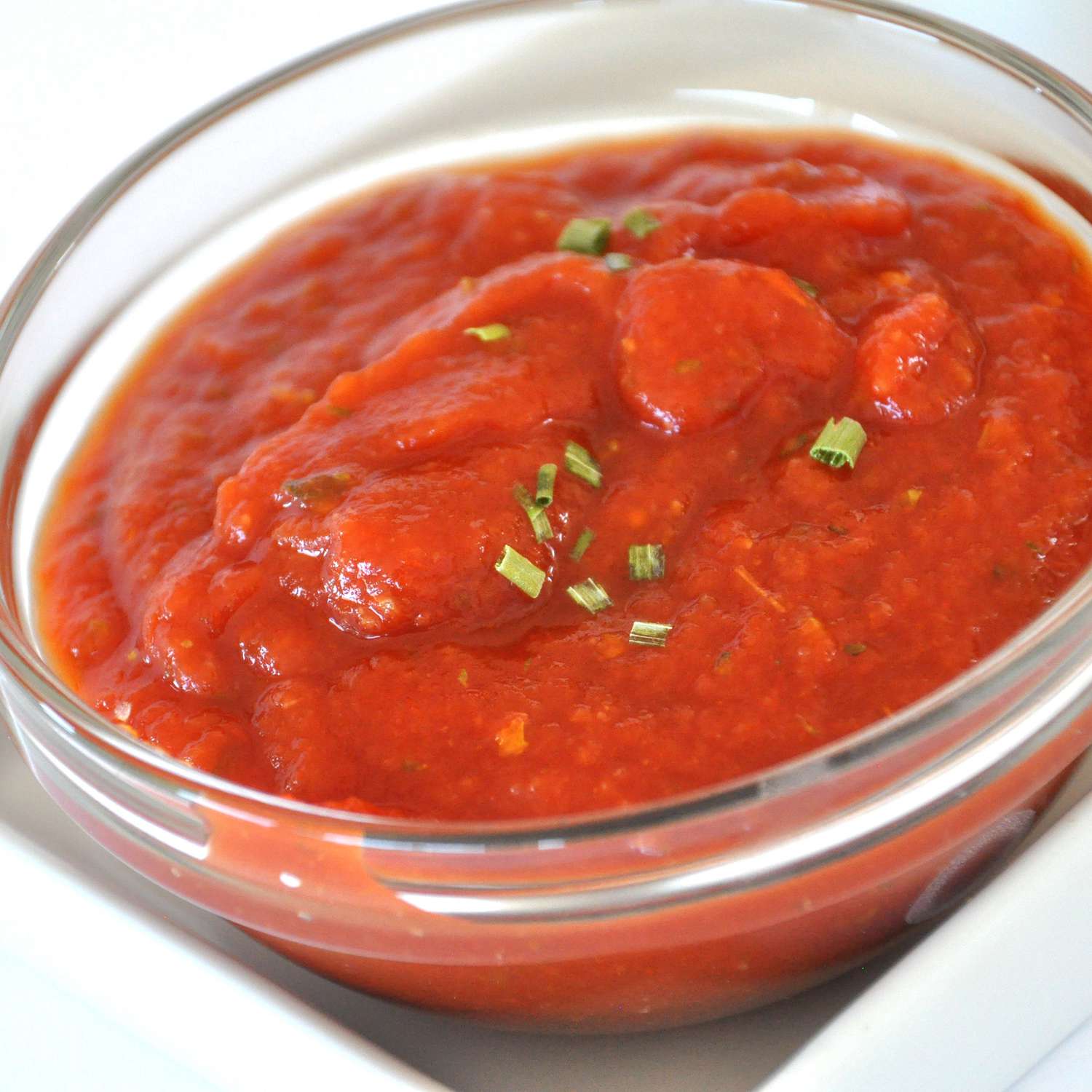 close up view of Easy Pizza Sauce in a glass bowl