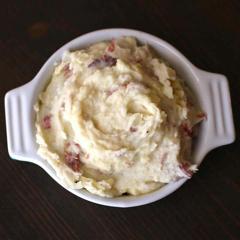 overhead view of Mashed Red Potatoes in white a baking dish