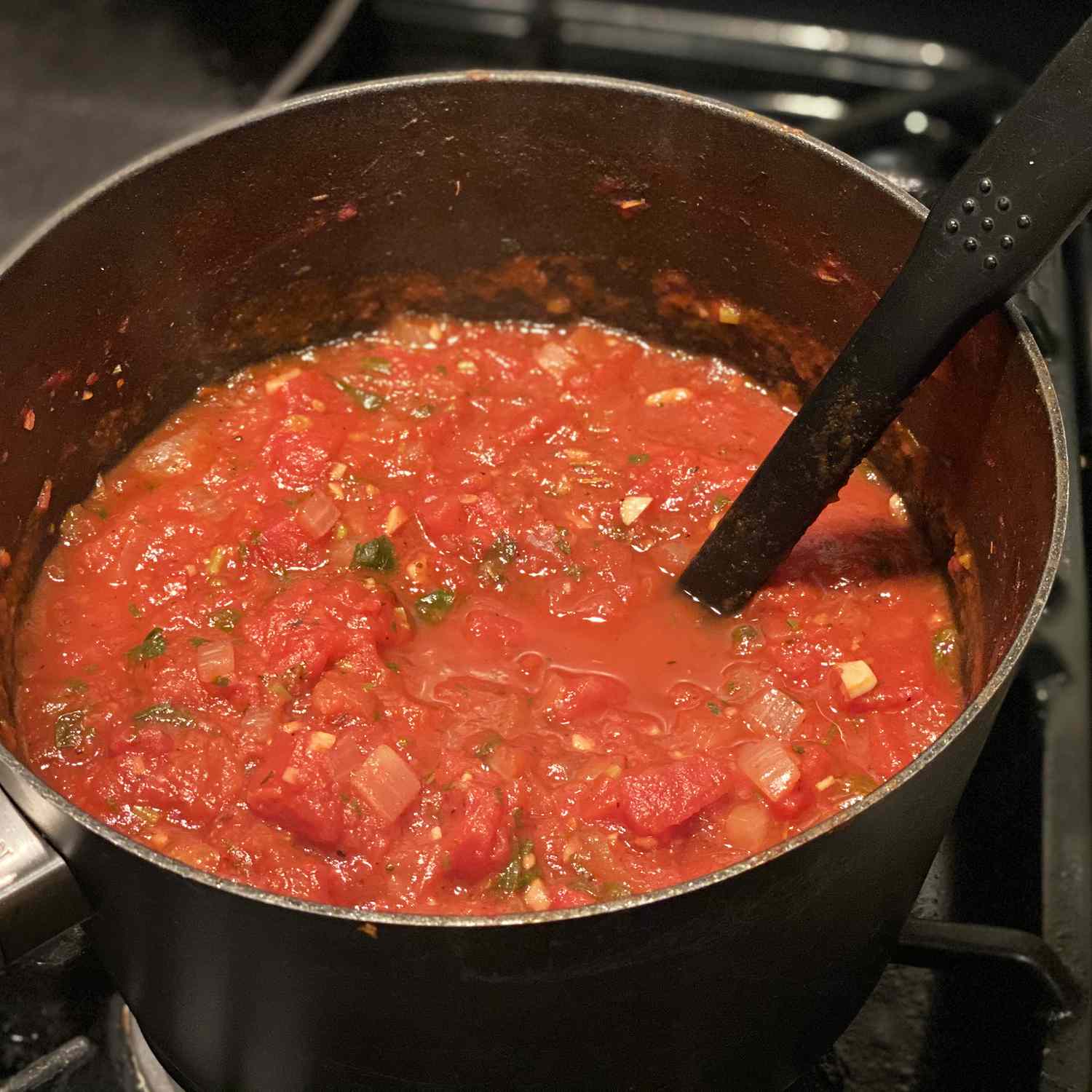 close up view of Arrabbiata Sauce in a pot on a burner