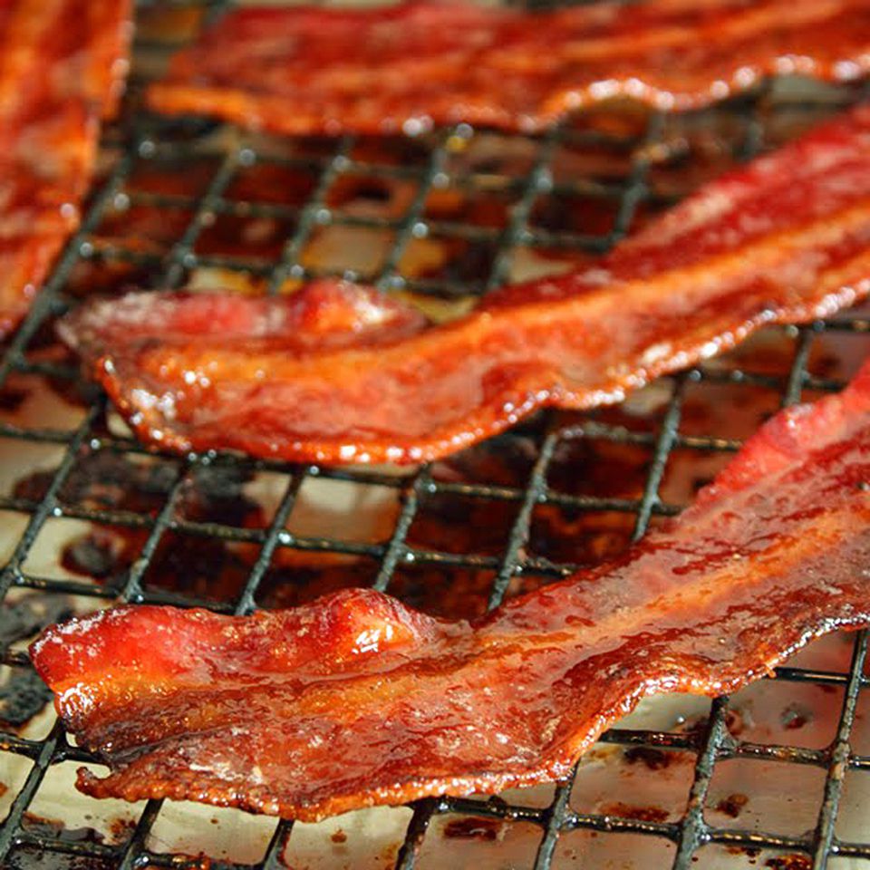close up view of Candied Bacon on a cooling rack