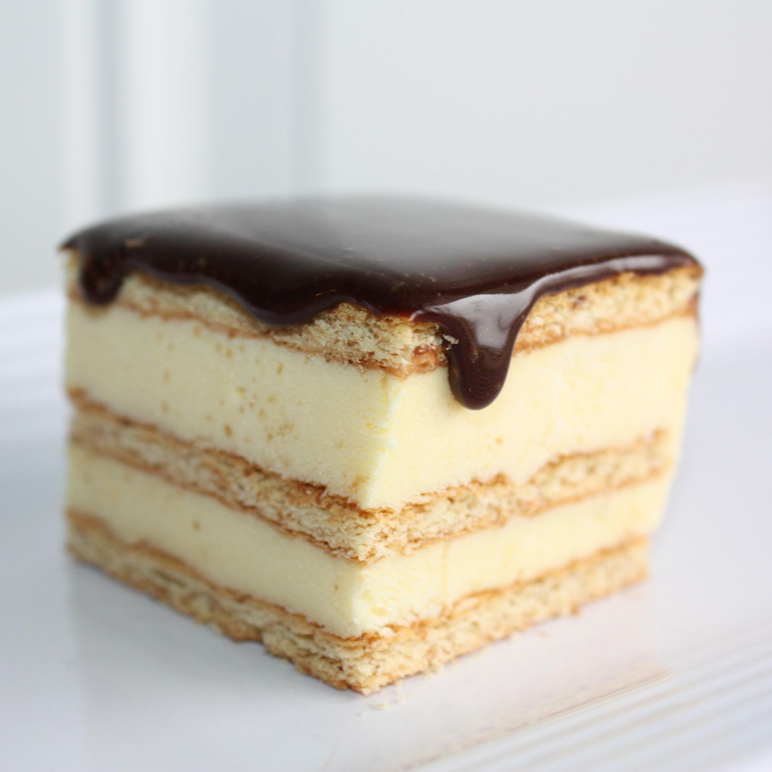 close up view of a slice of Chocolate Eclair Cake