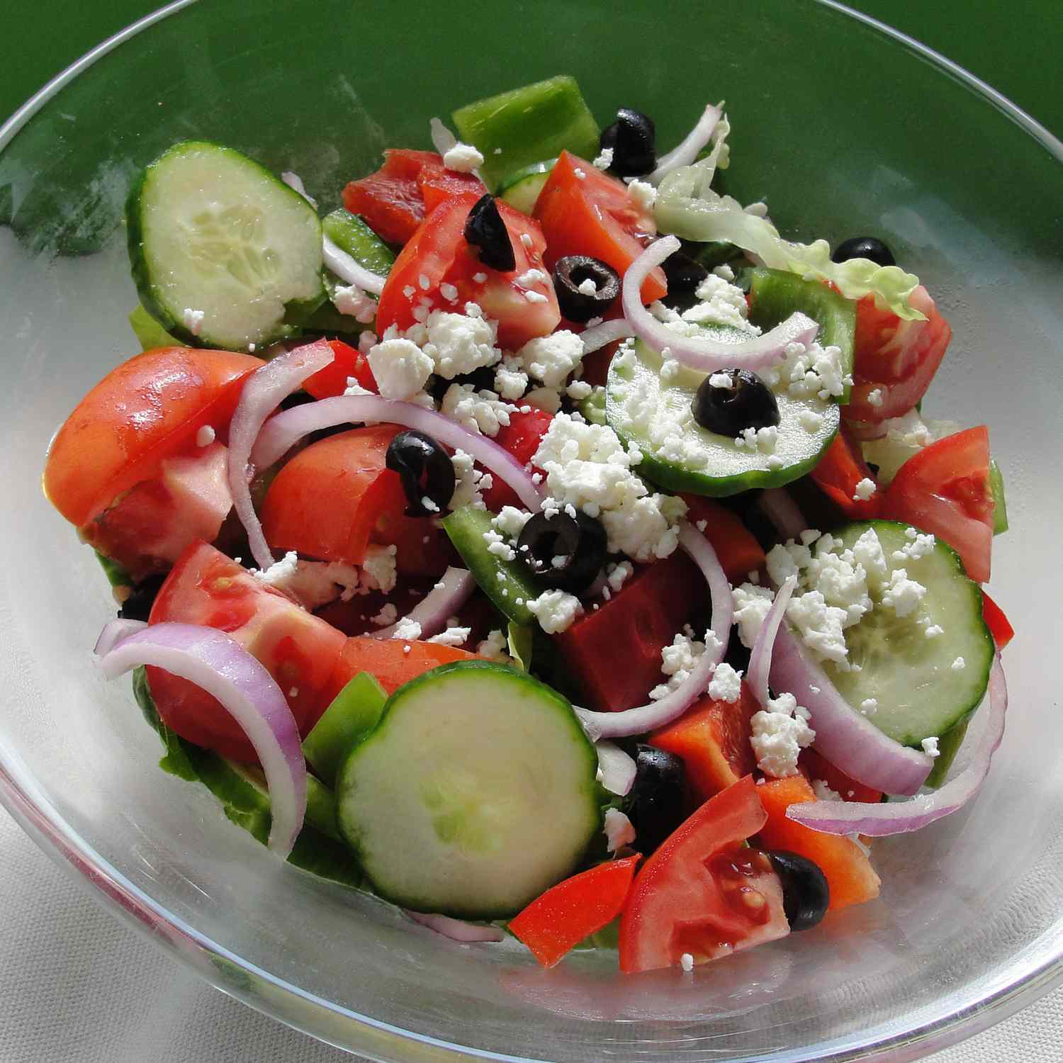 close up view of Greek Salad in a glass bowl