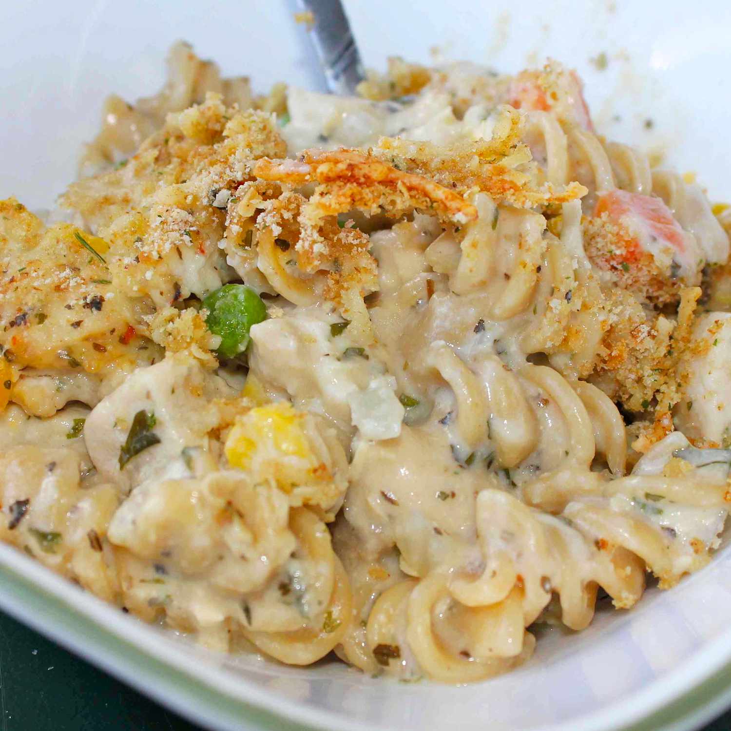 close up view of Chicken and Pasta Casserole with Mixed Vegetables in a white bowl