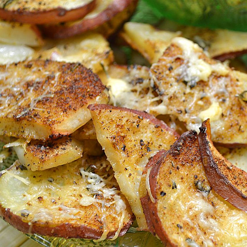 close up view of Oven Roasted Parmesan Potatoes on a plate
