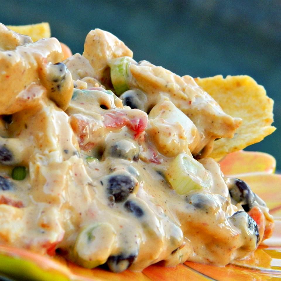 close up view of Chicken Nacho Dip with tortilla chips