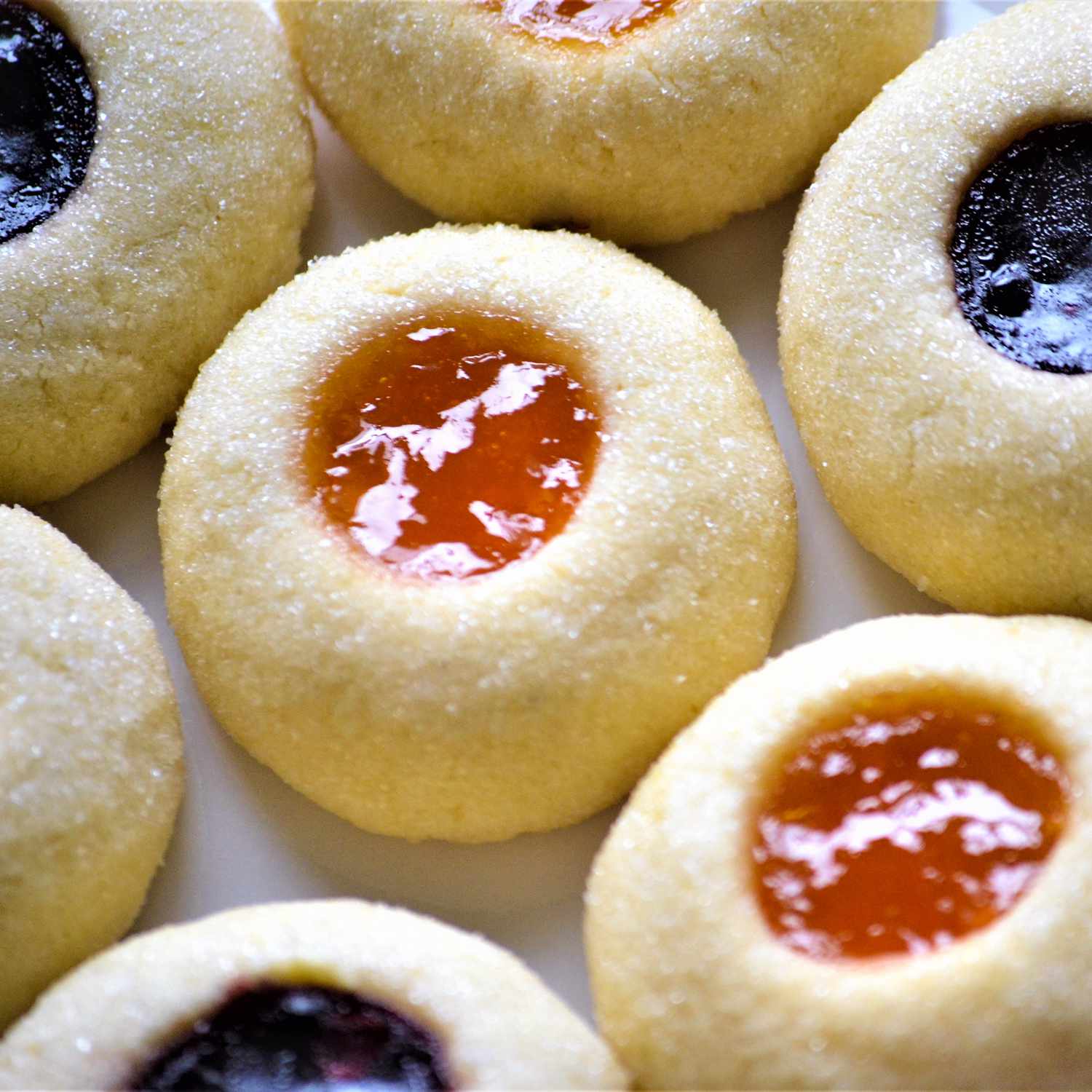 close up view of Thumbprint Cookies on a white platter
