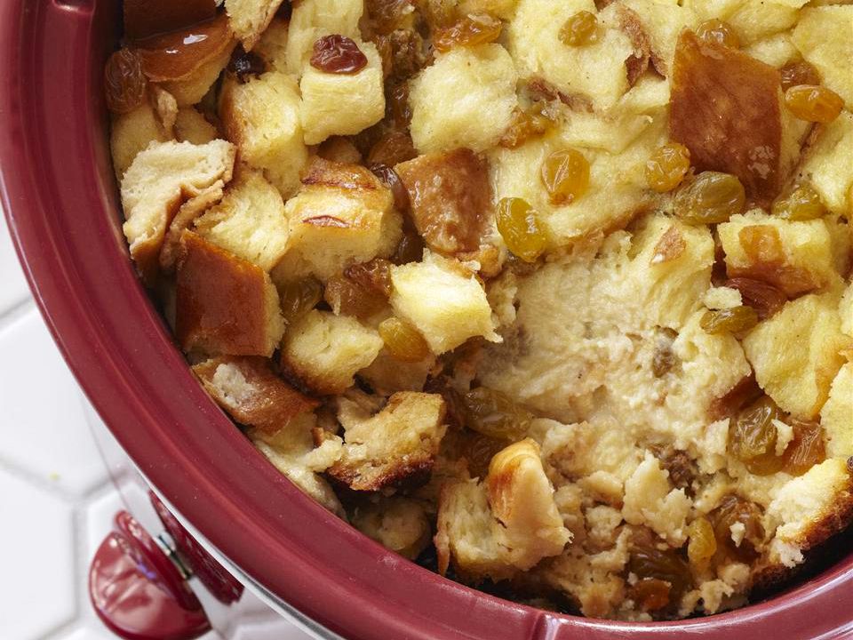 close up view of Bread Pudding in a maroon Slow Cooker