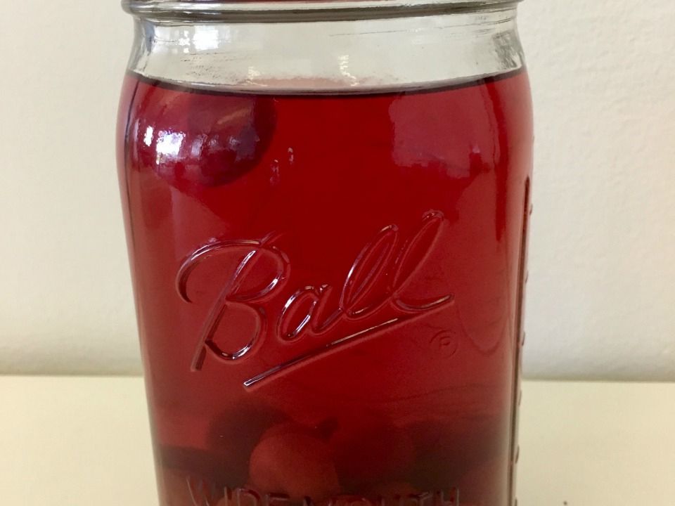close up view of Door County Cherry Bounce in a glass