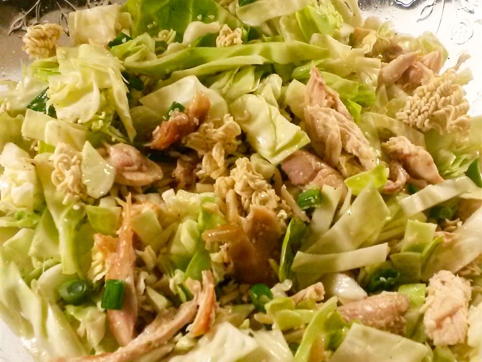 close up view of Chinese Chicken Salad in a glass bowl