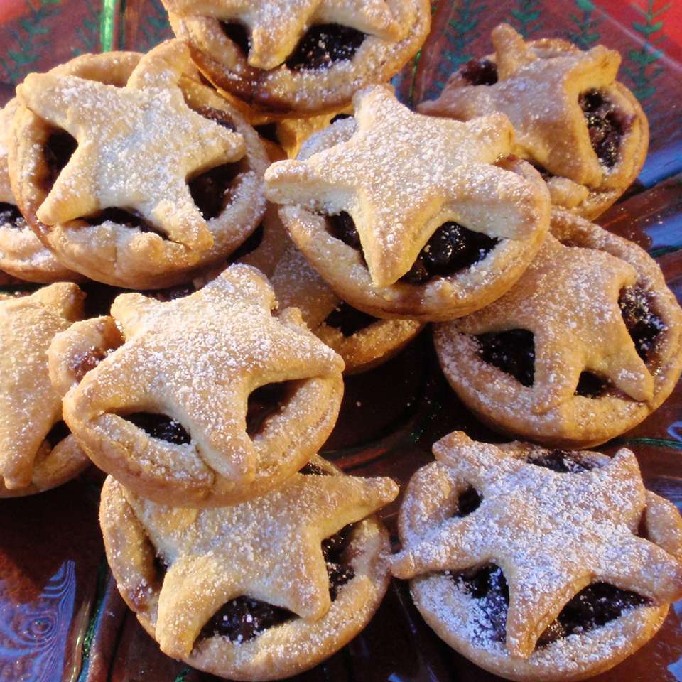 pile of mini orange mince pies decorated with pastry stars