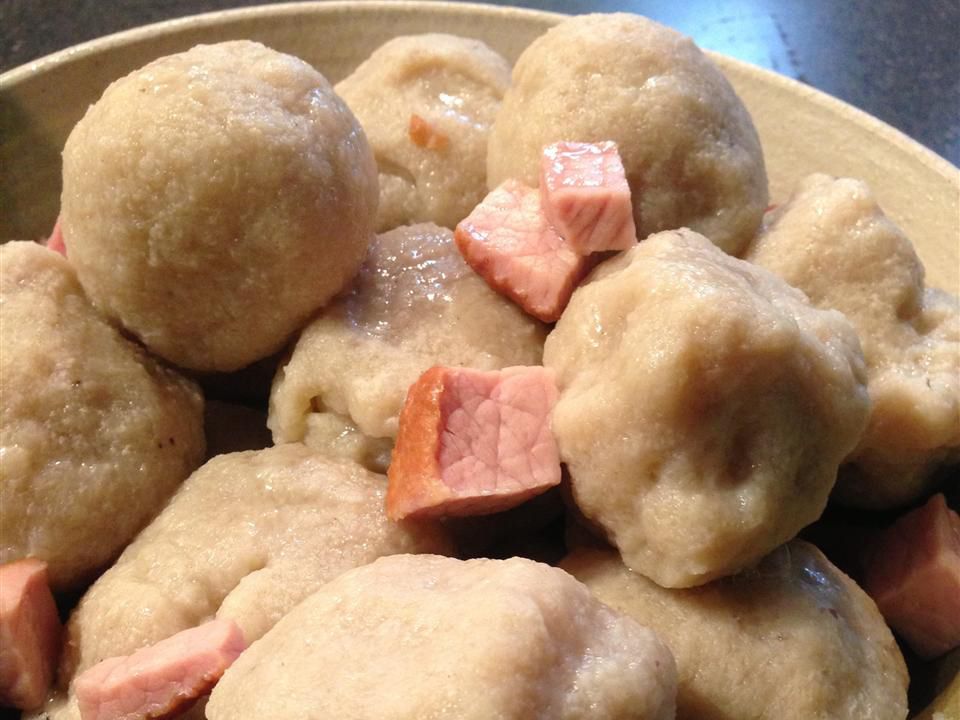 close up view of Potato Klubb with ham cubes in a bowl