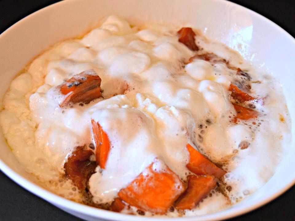 close up view of Sweet Potatoes (Yams) and Marshmallows in a white bowl