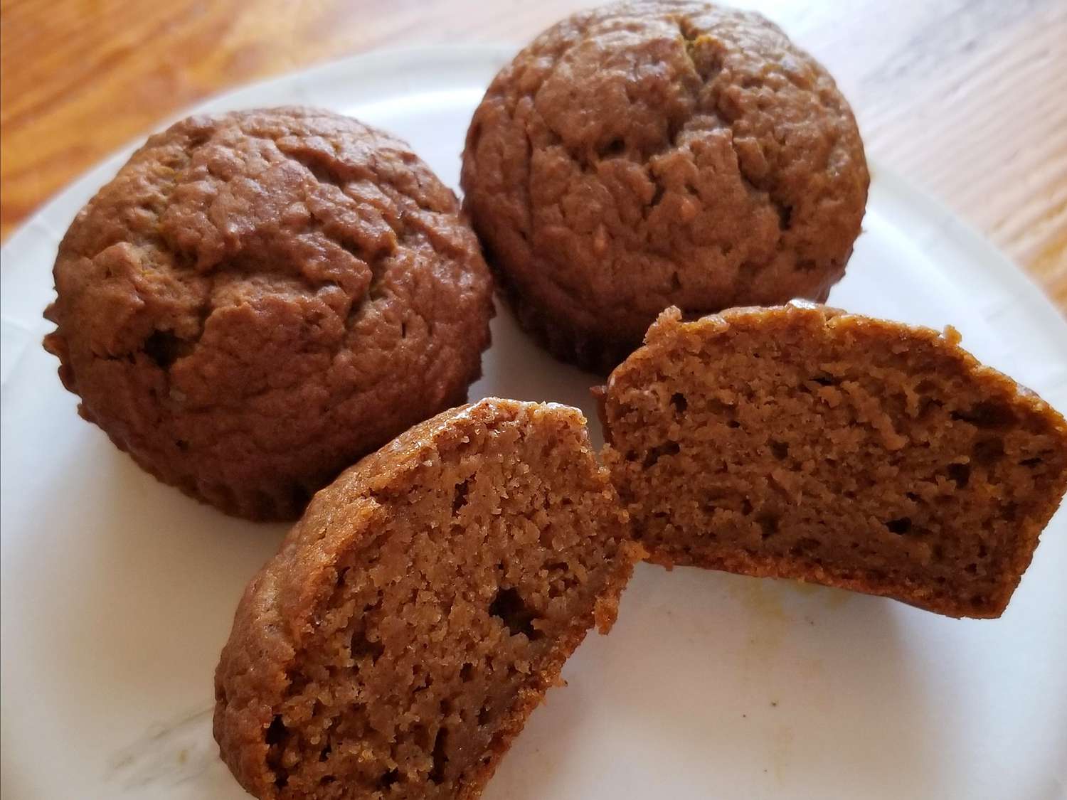 close up view of Pumpkin Muffins on a white plate