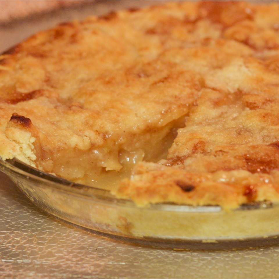 close up view of Dutch Apple Pie in a glass pie pan