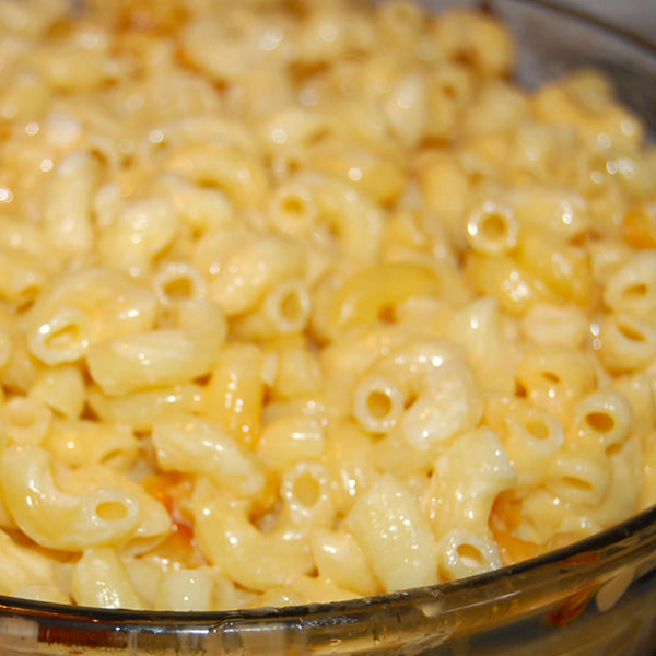 close up view of Classic Macaroni and Cheese in a glass bowl