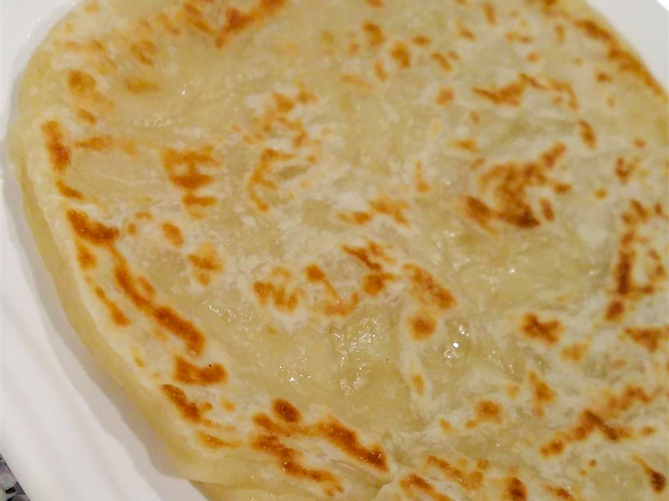 close up view of a Sabaayad (Somali Flatbread) on a plate