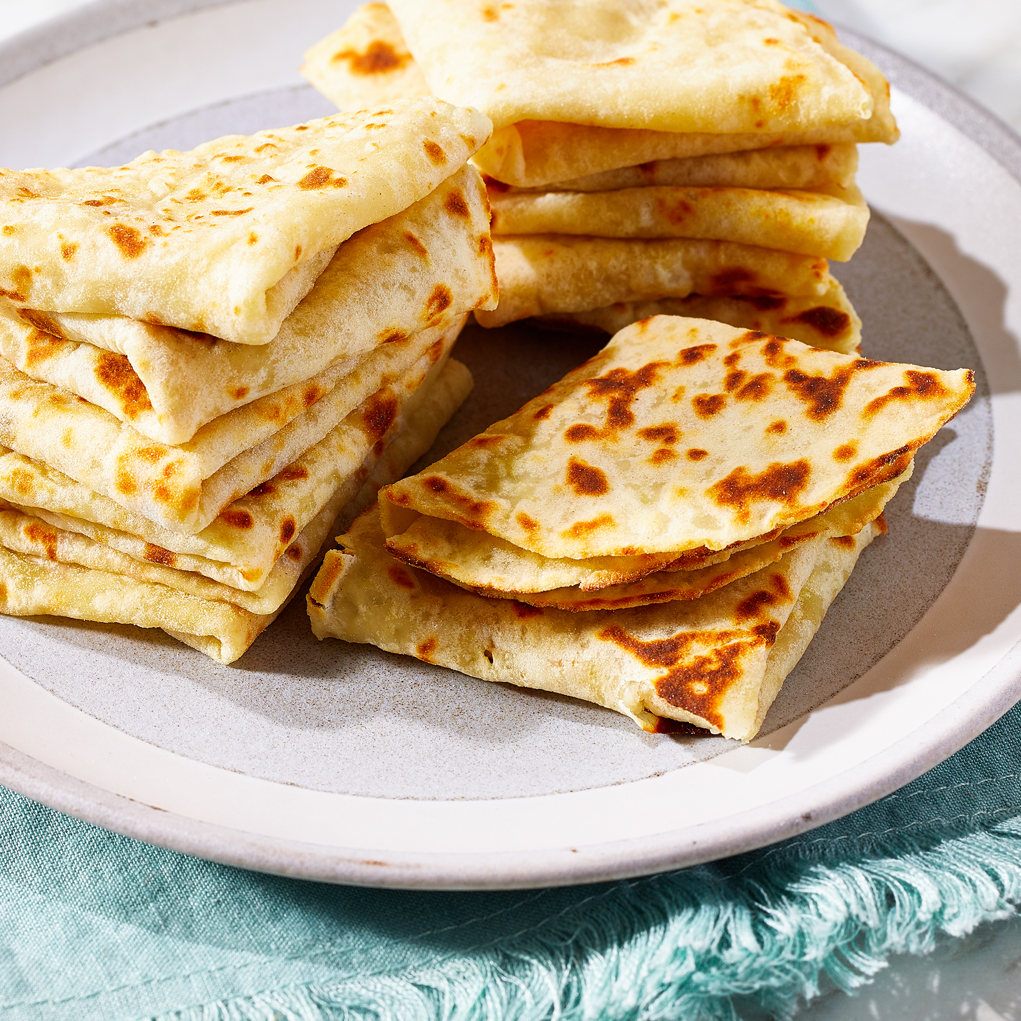 high angle looking at Norwegian Lefse stacked on a plate