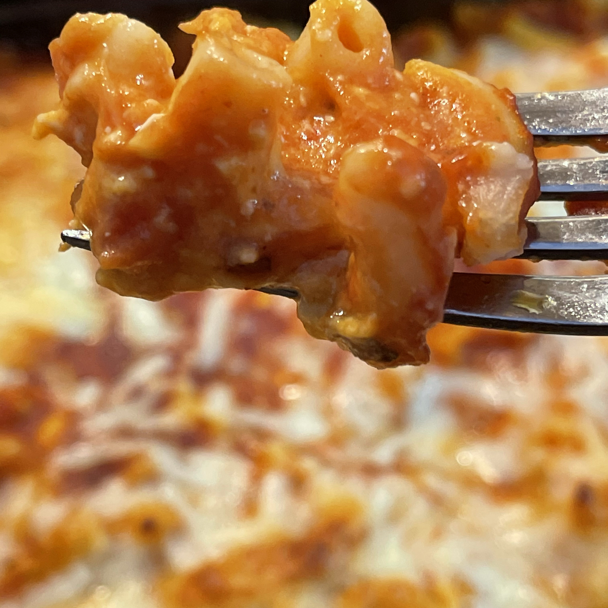 close up view of Baked Spaghetti Casserole on a fork