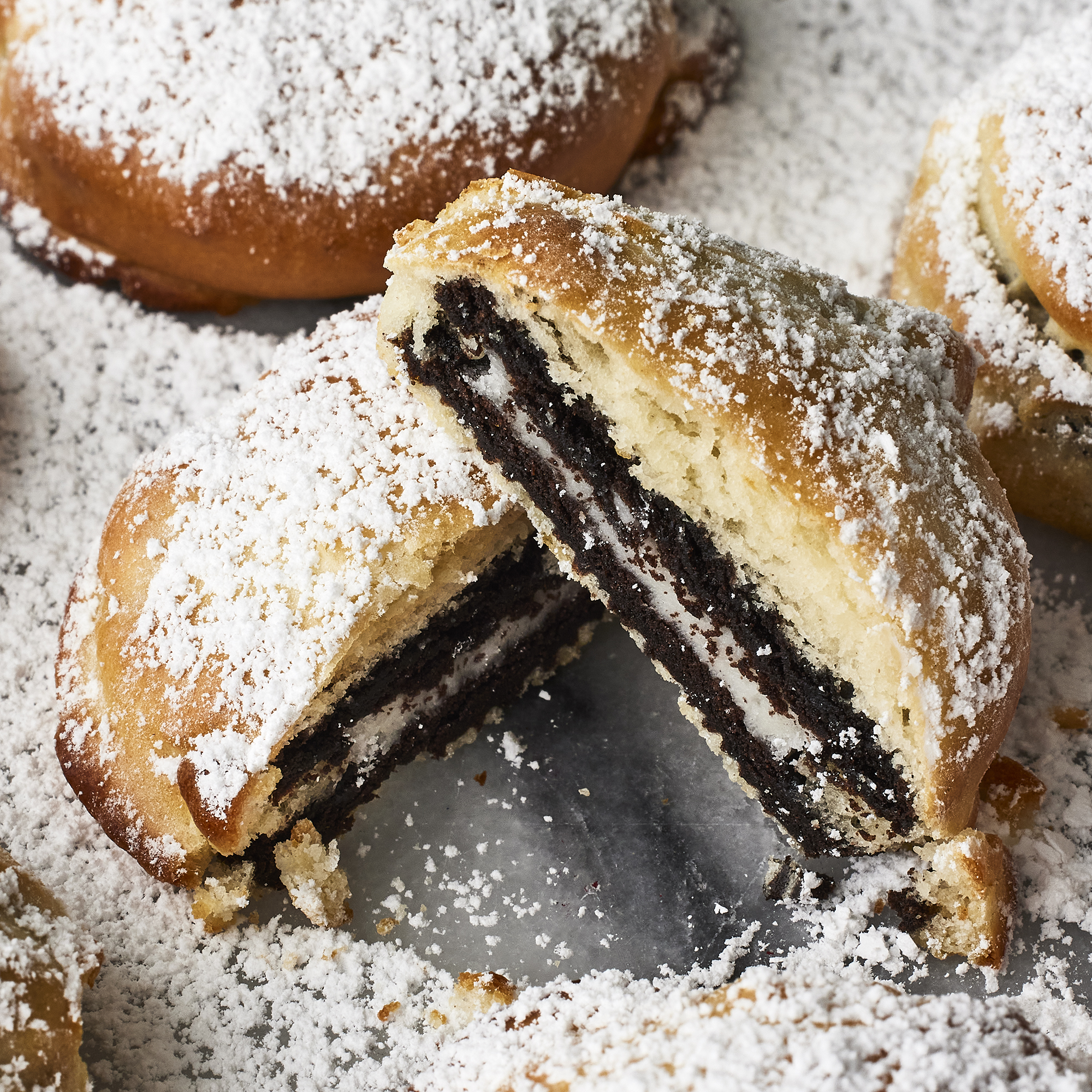 close up on a bunch of air fryer Oreo's topped with confectioners' sugar
