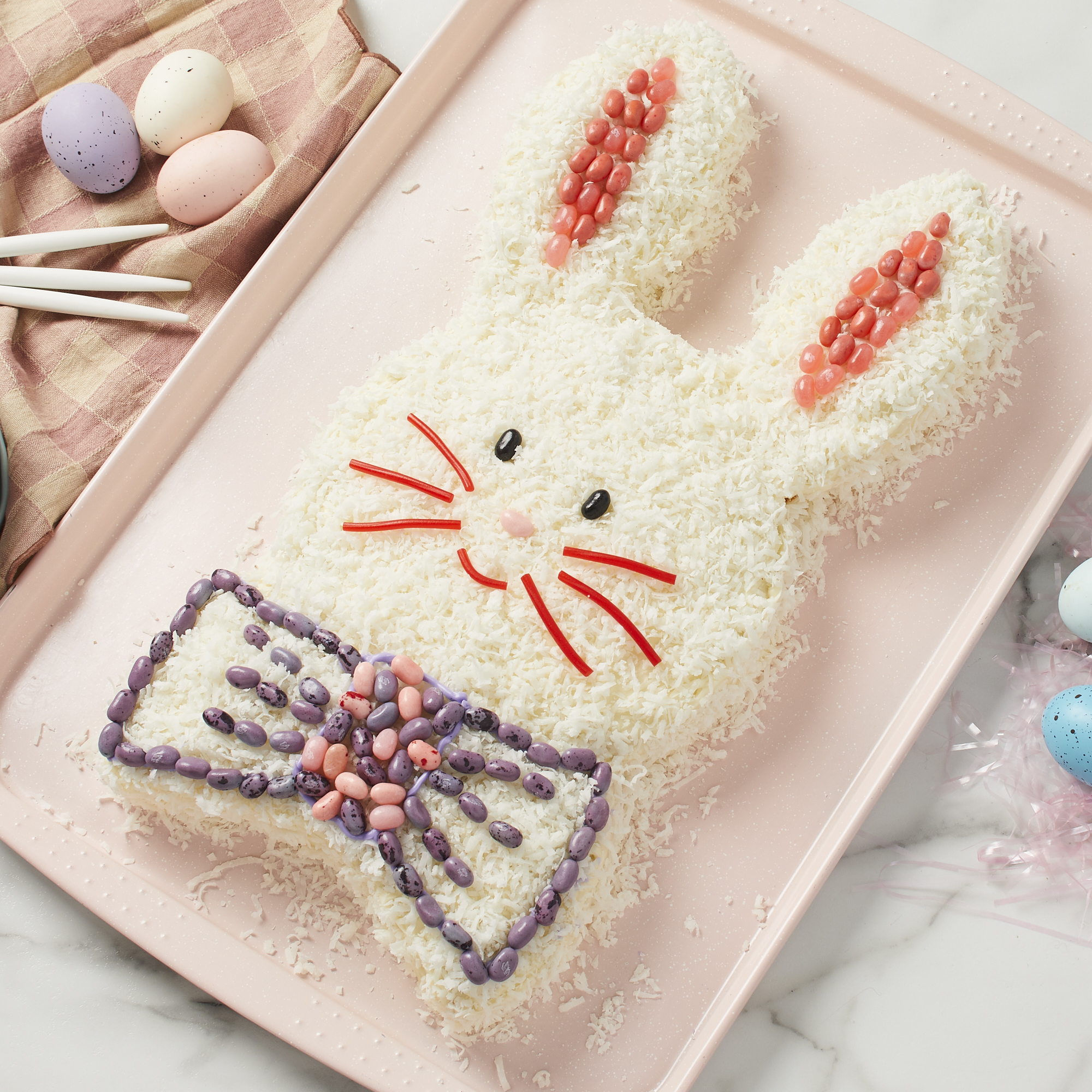 looking down at a whole bunny cake on a tray