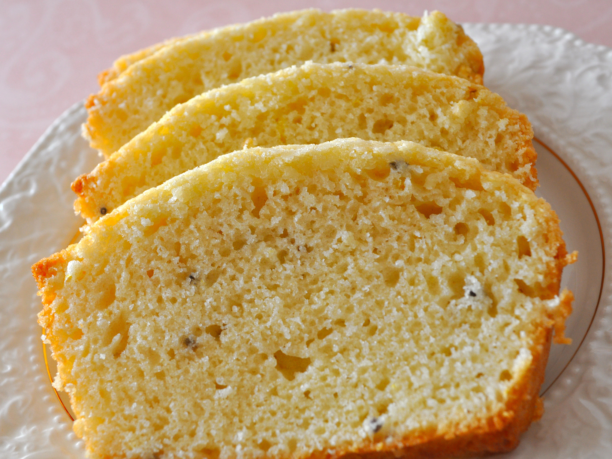 close up view of sliced Lavender Tea Bread on a plate