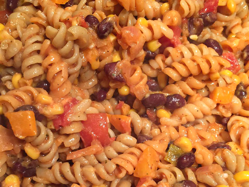 close up view of Mexican Pasta with black beans, tomatoes, peppers, and corn