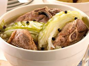 close up view of Fårikål, a meat and cabbage dish in a bowl