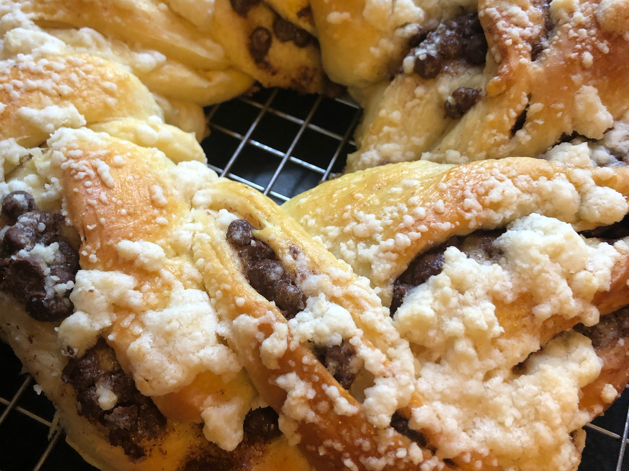 close up view of a round Chocolate Babka on a cooling rack