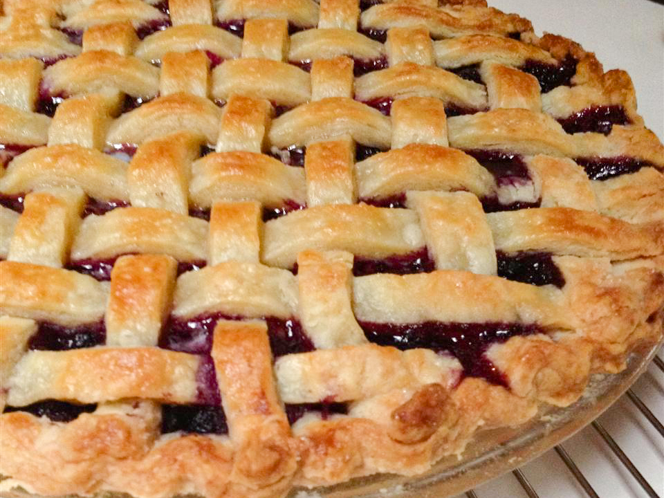 close up view of a Wild Blueberry Pie with a lattice crust