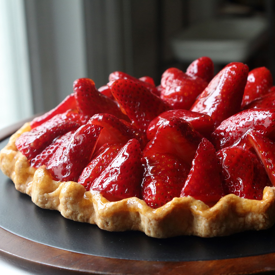 close up view of a Fresh Strawberry Tart on a platter
