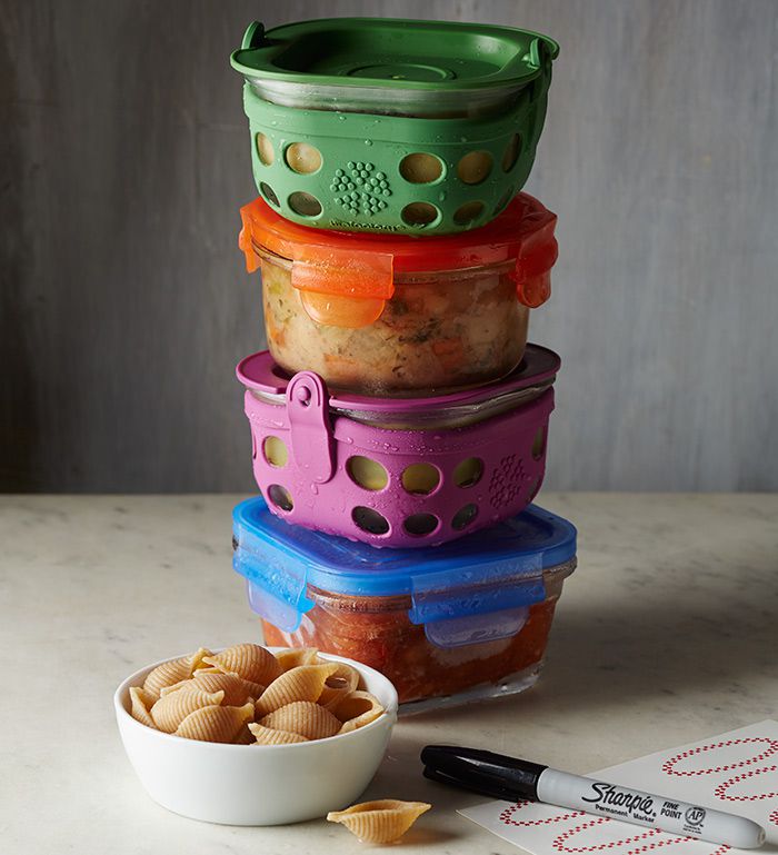 Stack of storage containers containing soups