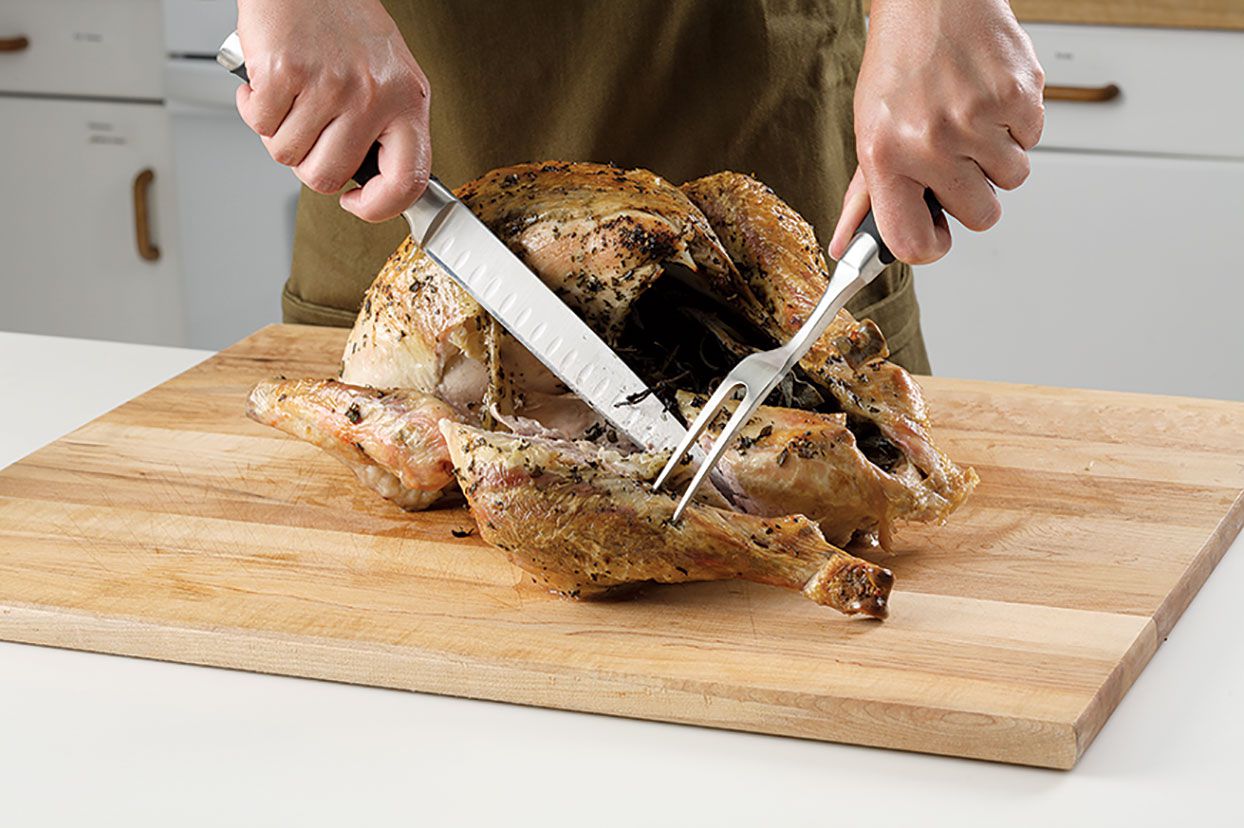 carving a turkey: removing the leg