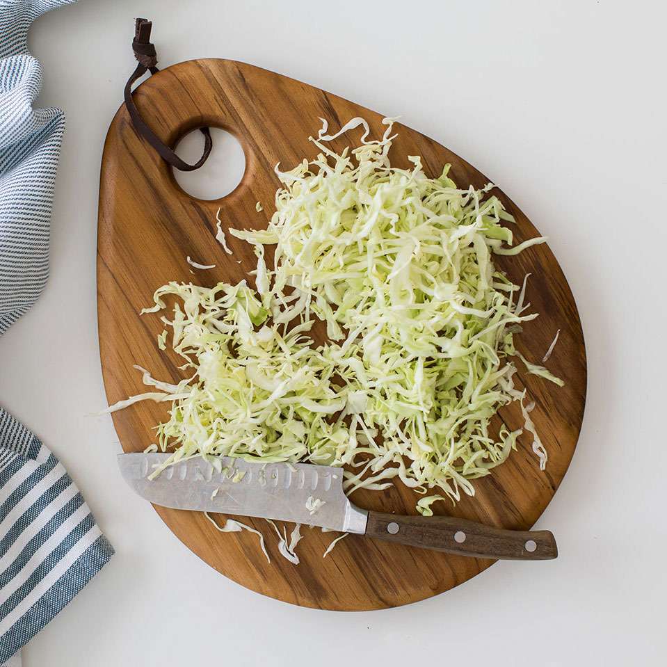 Chopping cabbage on a cutting board