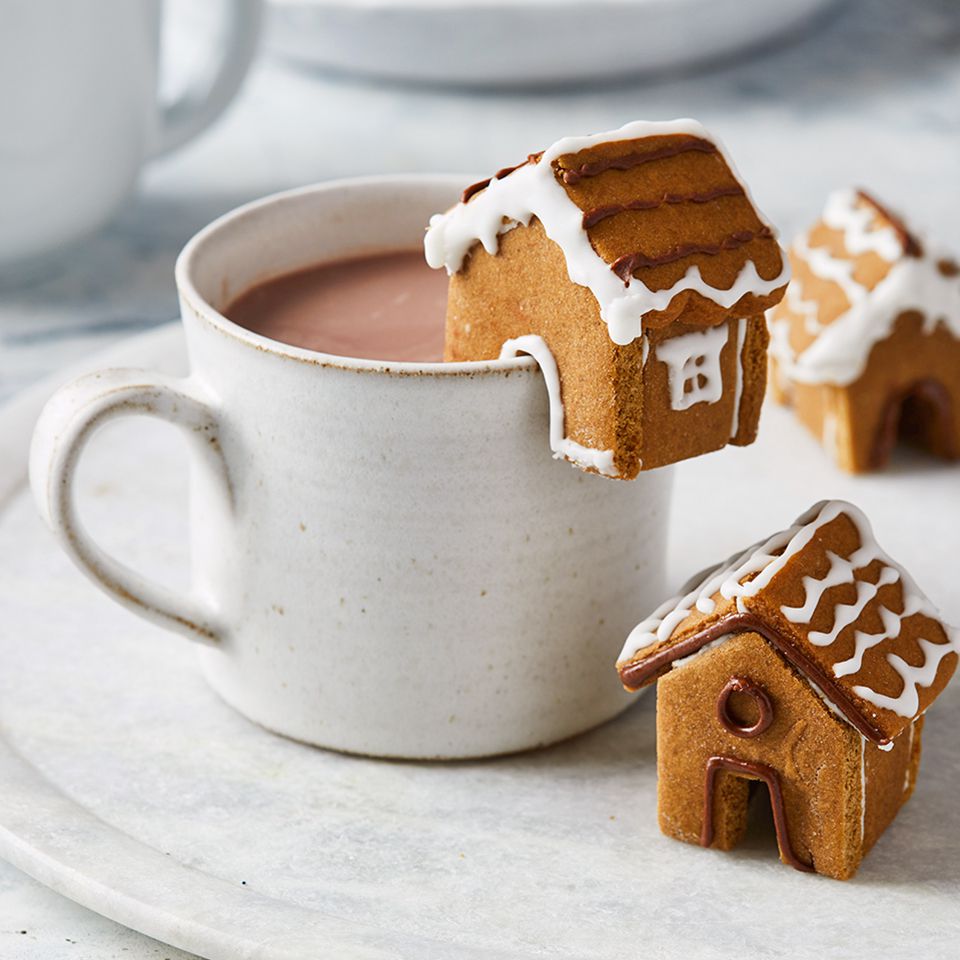 mini gingerbread houses on a mug