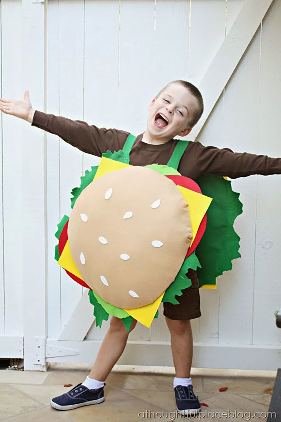 child wearing cheeseburger costume