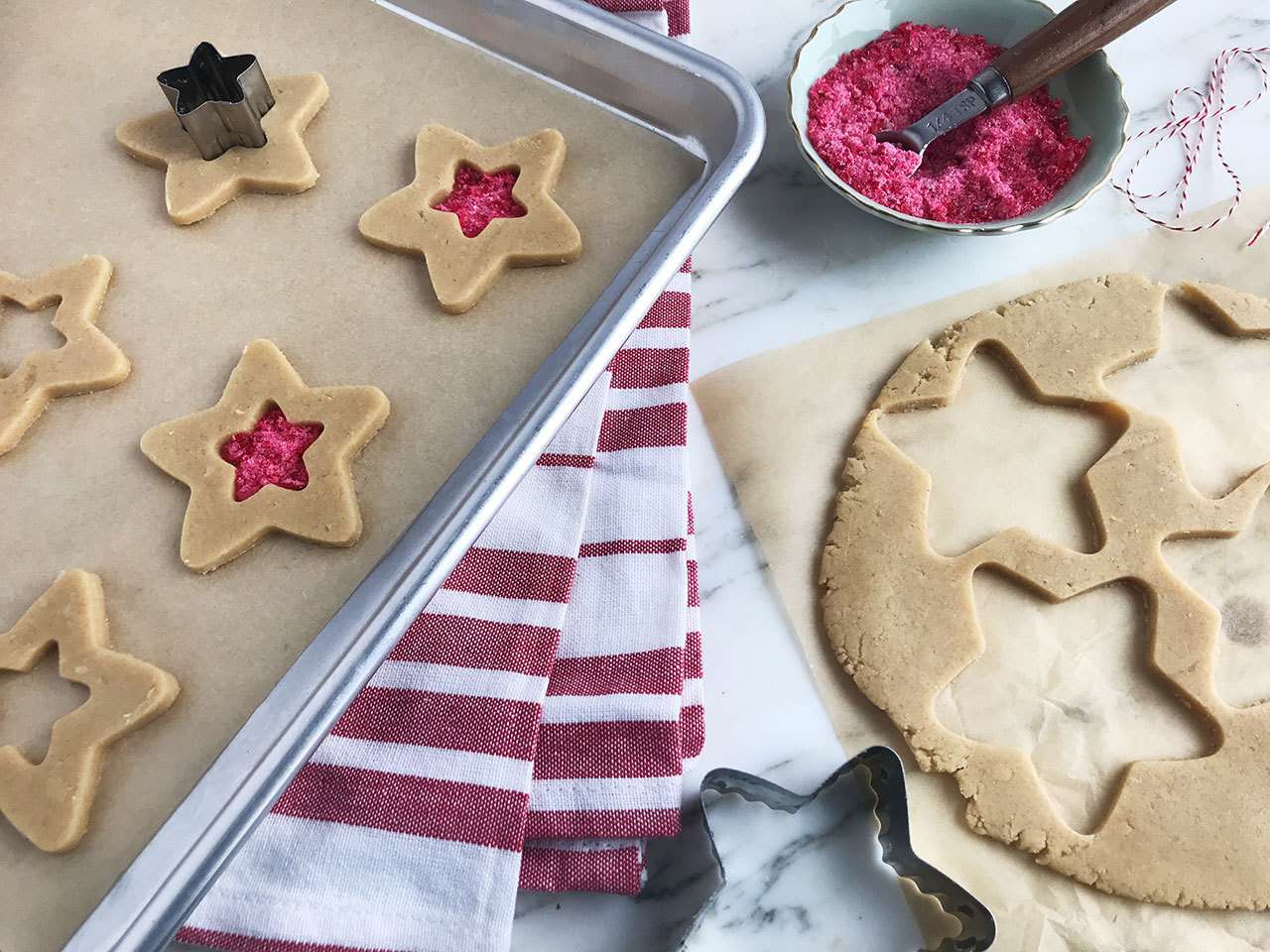 cookie cut-outs on a baking sheet