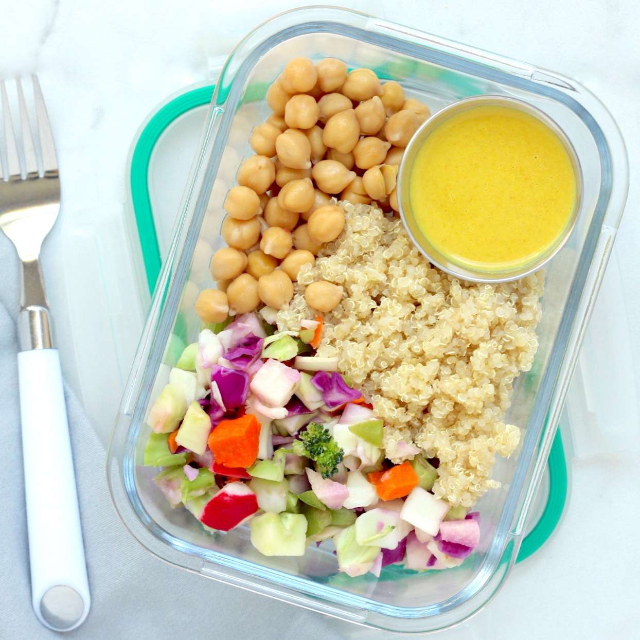 veggie grain bowl in a glass to-go container