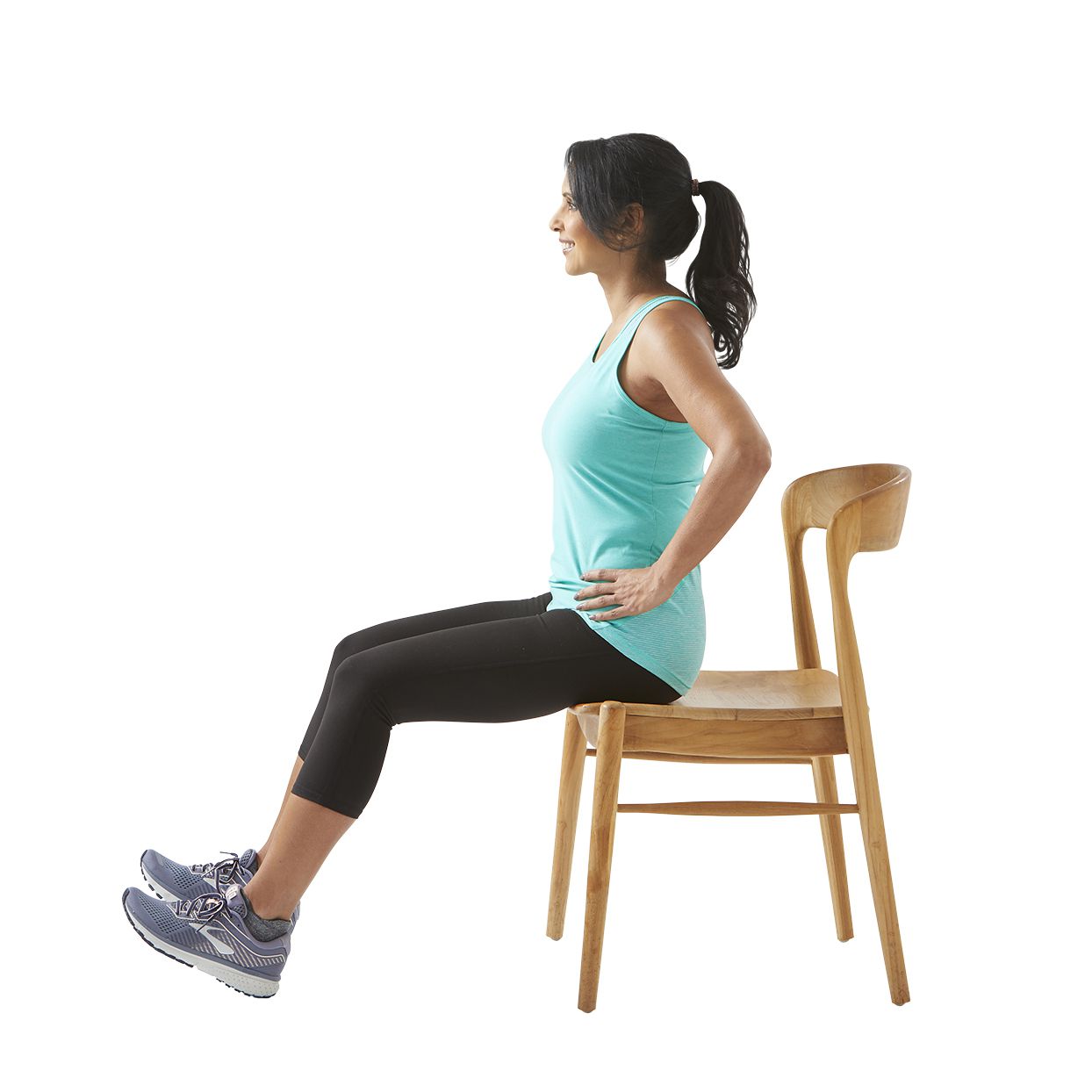 woman stretching in chair