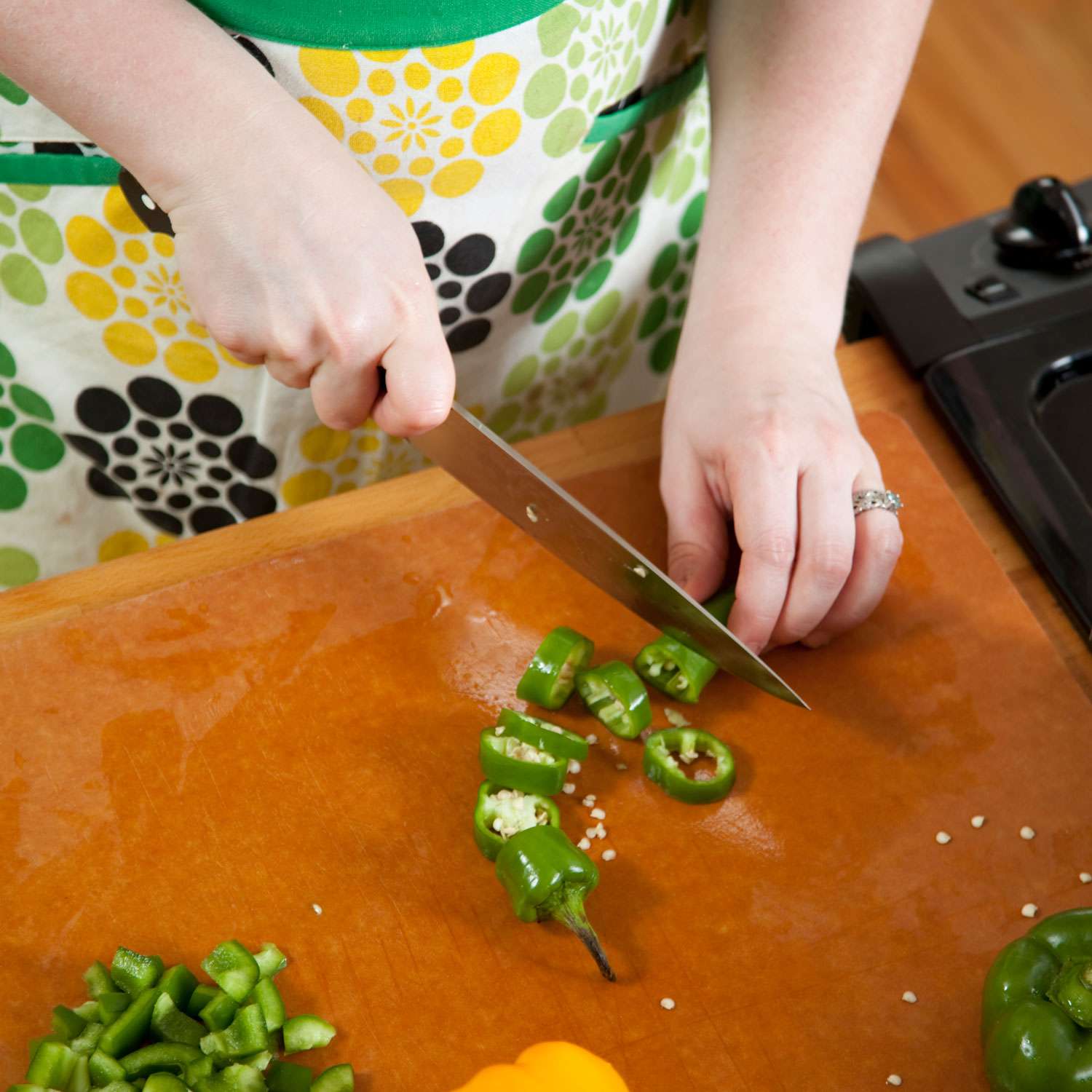 chopping jalapeno peppers