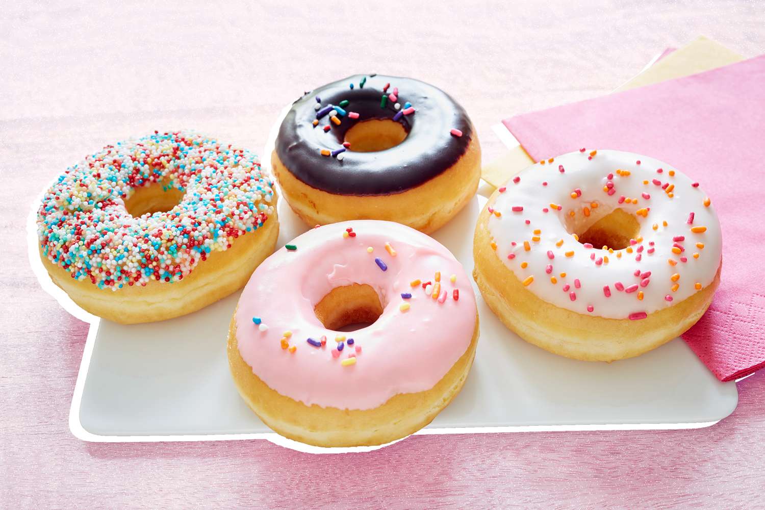 Donuts sitting on a table