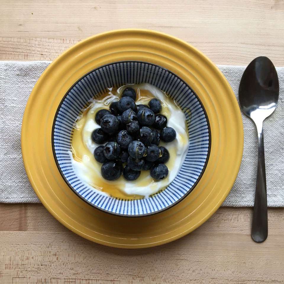 yogurt bowl with fruit and honey