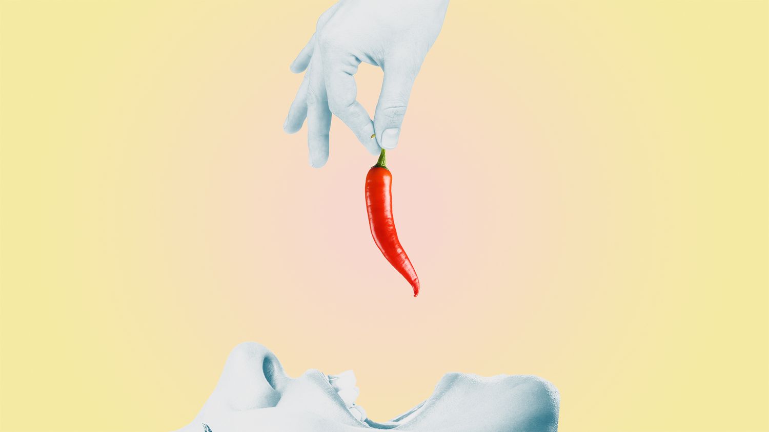 A woman eating a Red chilli pepper