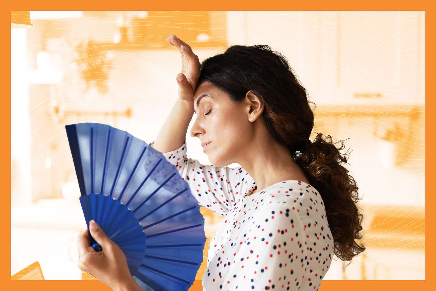 young woman feeling overheated using hand fan