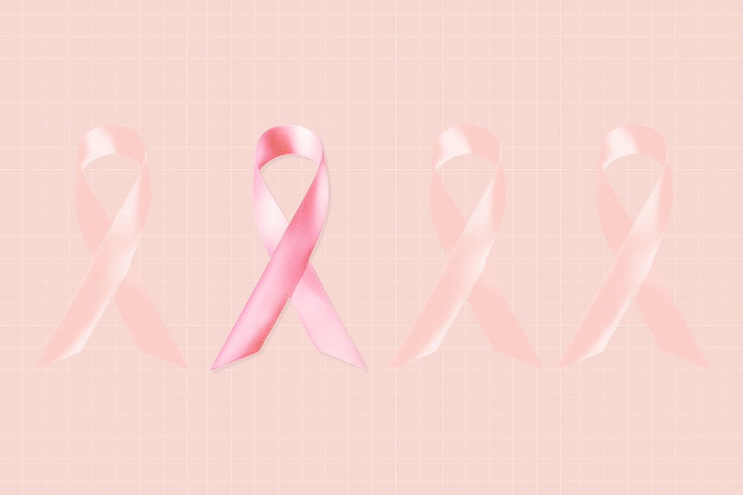 4 Breast cancer ribbons on a pink backgrounnd. One of the ribbons is in full color while the other 3 blend into the background