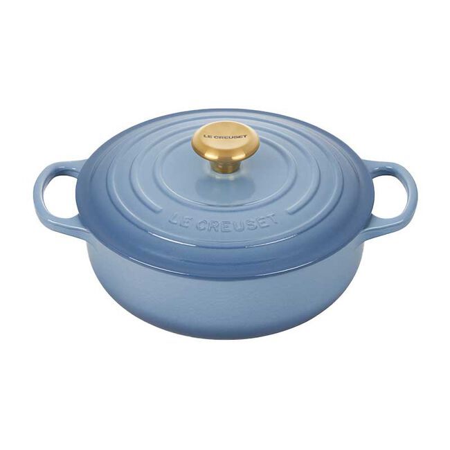 blue dutch oven on white background