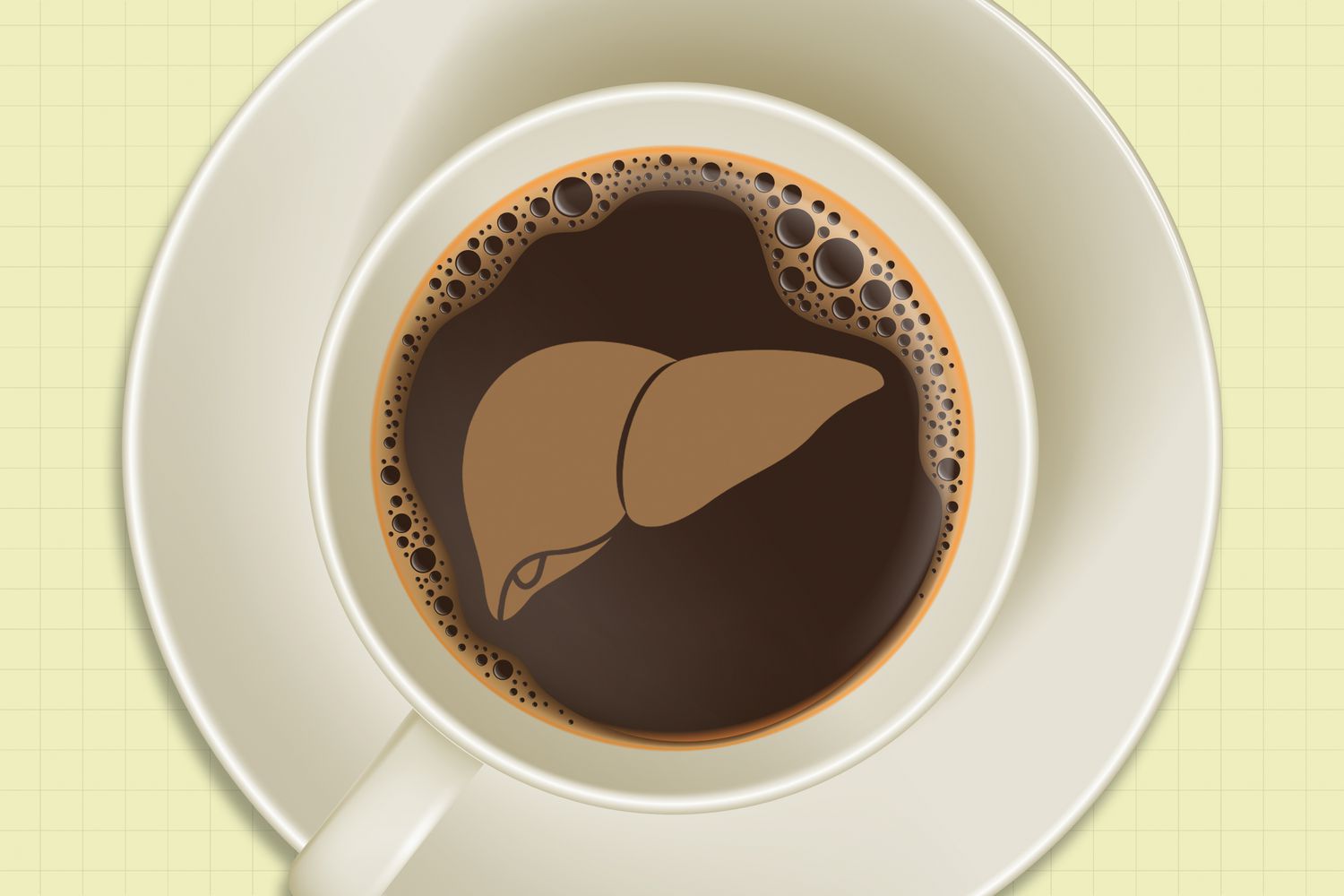 A coffee cup full of coffee with the shape of a liver in it